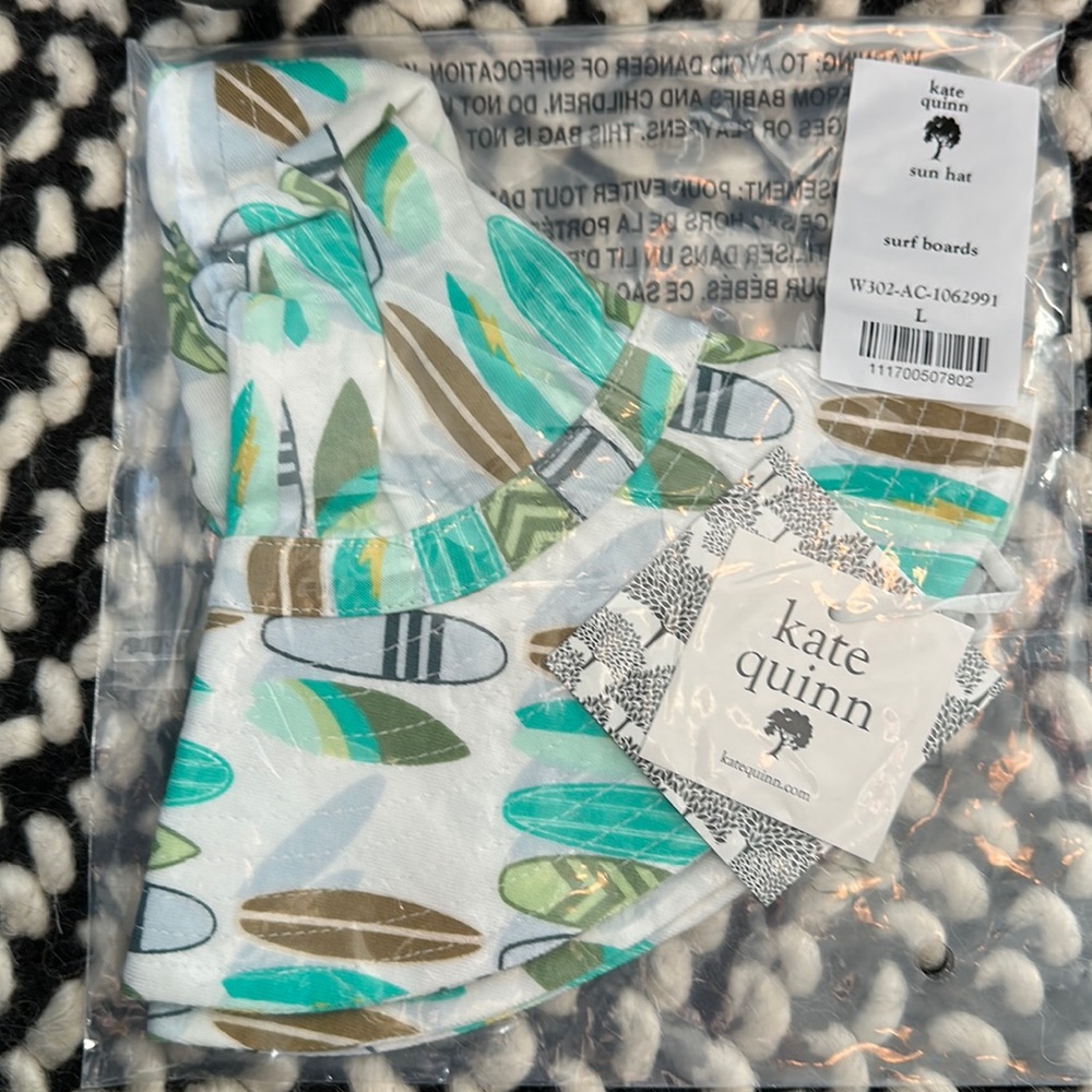 Kate Quinn sun hat 2023 surfboards